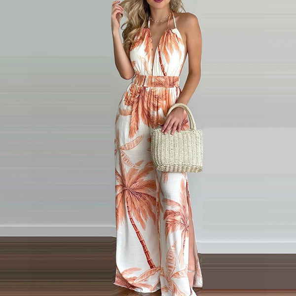 Floral Backless Beach Romper: Sleeveless Vacation Jumpsuit with Adjustable Fit