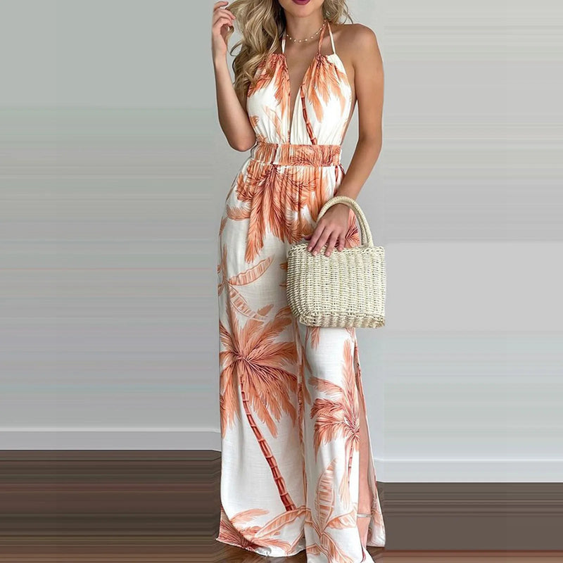 Floral Backless Beach Romper: Sleeveless Vacation Jumpsuit with Adjustable Fit