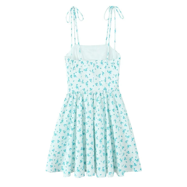 EDSA Women's Floral Mini Dress - Backless Beach Sundress w/ Thin Straps, Empire Waist & Side Pockets | Summer 2025