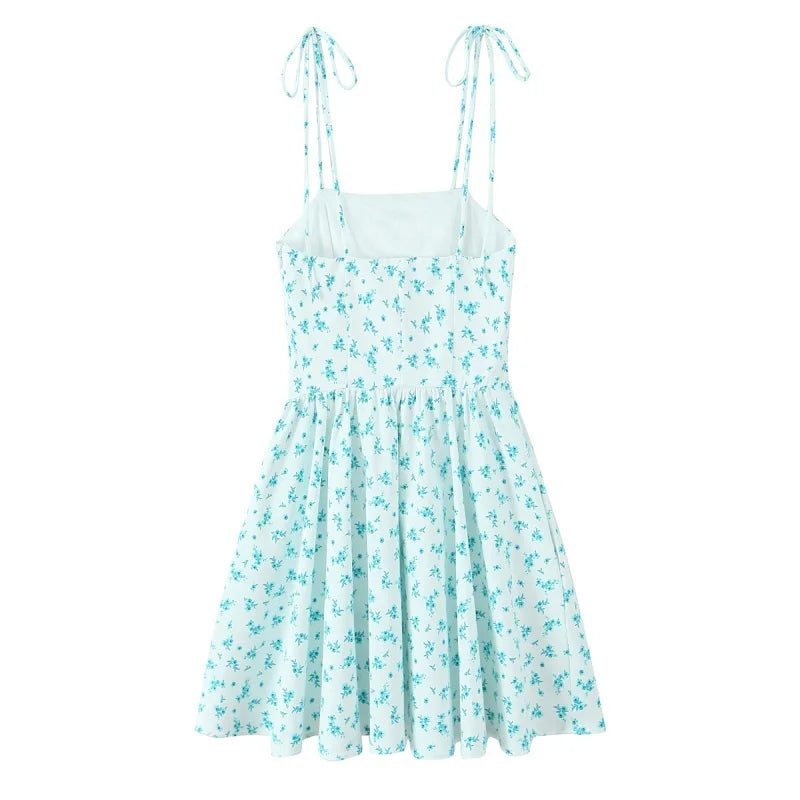 EDSA Women's Floral Mini Dress - Backless Beach Sundress w/ Thin Straps, Empire Waist & Side Pockets | Summer 2025